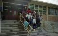Photograph: [Gates Elementary Students and Teacher on School Steps]