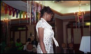 Primary view of object titled '[D'Shandra Walker Walking up to Receive Award at Service to Youth Award Program]'.