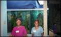 Photograph: [Two Young Girls and Aquarium at Children's Museum]