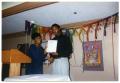 Photograph: [Young Adult Receiving Award at Service to Youth Award Program]