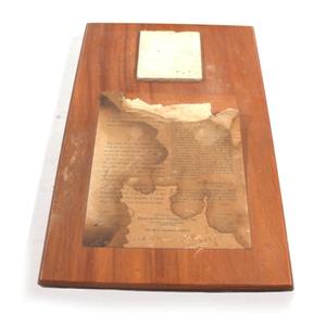 Primary view of object titled '[Plaque Containing an Alamo Tile]'.