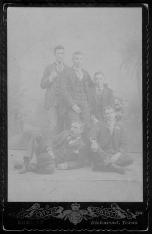 [Five young men wearing three-piece suits.]