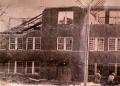 Thumbnail image of item number 1 in: 'Brick School Building Being Torn Down'.