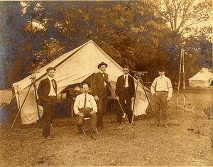 Primary view of object titled 'Railroad Survey Crew Poses in Front of Tent, c. 1902'.