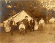 Thumbnail image of item number 1 in: 'Railroad Survey Crew Poses in Front of Tent, c. 1902'.