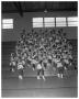 Photograph: [Anderson High School Cheerleaders Standing on Bleachers]