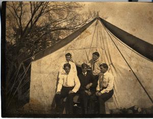 Railroad Survey Crew Members Pose in Front of Tent, c. 1902