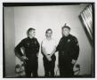 Thumbnail image of item number 3 in: '[Lee Harvey Oswald Standing With Officers]'.