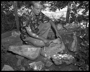 Man with rock collection