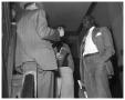 Thumbnail image of item number 1 in: 'Young African American talking to Reporter'.