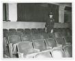 Photograph: [Officer in Texas Theater]