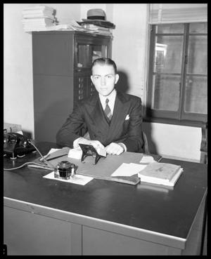 Mace Thurman Jr. at desk