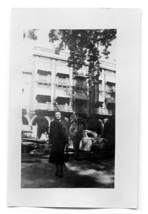 Vivian Osio standing in front of an hotel