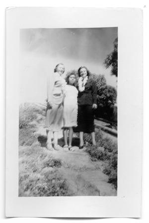 Marie Burkhalter and with two unknown people