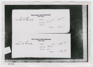 [Photograph of Pay Stubs]
