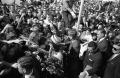 Photograph: [President and Mrs. Kennedy greeting crowds at Love Field]