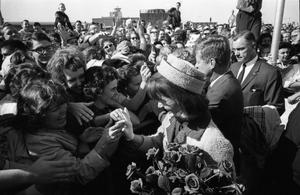 [The Kennedys greeting the crowd at Love Field]