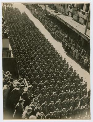 [Photograph of Military Parade Through Town]