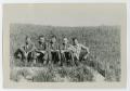 Photograph: [Five Servicemen Sitting Together]