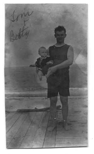 [Tom Scott with daughter Betty Scott at the beach]