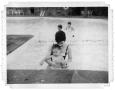 Thumbnail image of item number 1 in: 'Ray Delphenis and Durk Delphenis in a pool at the Lakewood County Club'.