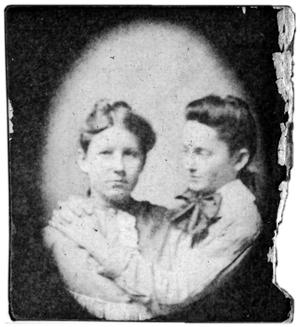 Portrait of two girls embracing
