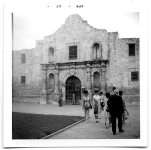 People walking outside The Alamo