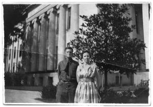 Unidentified couple outside a government building