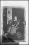Primary view of [Woman Sitting in Rocking Chair]
