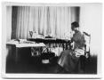 Photograph: Cora Lee Vise sitting at a table