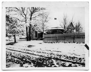 The Scrivner Home covered in snow