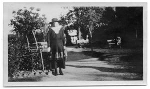 Neely Scrivner standing on a walkway in a park
