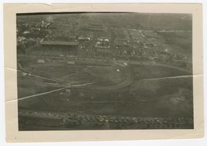 [Photograph of field from plane]