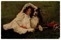 Thumbnail image of item number 1 in: '[Young Girl and Dog Seated on the Grass]'.
