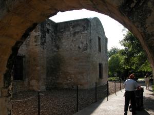 Primary view of object titled 'The Alamo through an archway'.