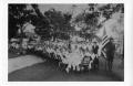 Photograph: [Boy Scout holding a Flag at a Picnic at Stark Park]