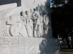 Monument in front of the Alamo, side view with sculptures of Defenders