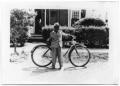 Photograph: [Portrait of a Boy With a Bicycle]