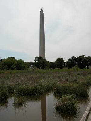 Primary view of object titled 'San Jacinto Monument with bayou in foreground'.