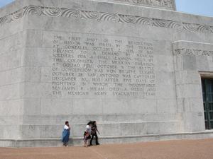 Engraved frieze on the San Jacinto Monument, The First Shot