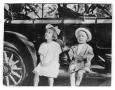 Thumbnail image of item number 1 in: '[Two children sitting on automobile]'.