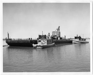 Barge P9016 with Workers and Tugboats