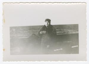 Primary view of object titled '[Soldier Smoking on a Boat]'.
