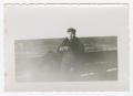 Photograph: [Soldier Smoking on a Boat]
