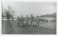 Thumbnail image of item number 1 in: '[Photograph of Five Signal Company Soldiers at Bridge]'.