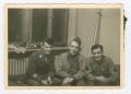 Photograph: [Three Soldiers Sitting on a Bunk]