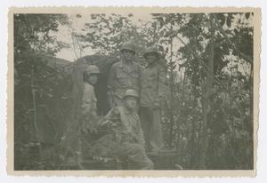 Primary view of object titled '[Photograph of Four Signal Company Soldiers in a Truck]'.