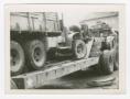 Photograph: [Soldiers Fastening Truck to a Hauler]