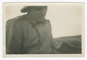 [Photograph of a Soldier Wearing a Coat]