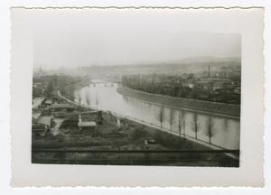 [Photograph of a Canal Passing Through a City]
